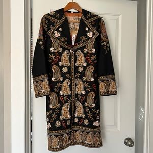 Beautiful embroidery on this Biya coat